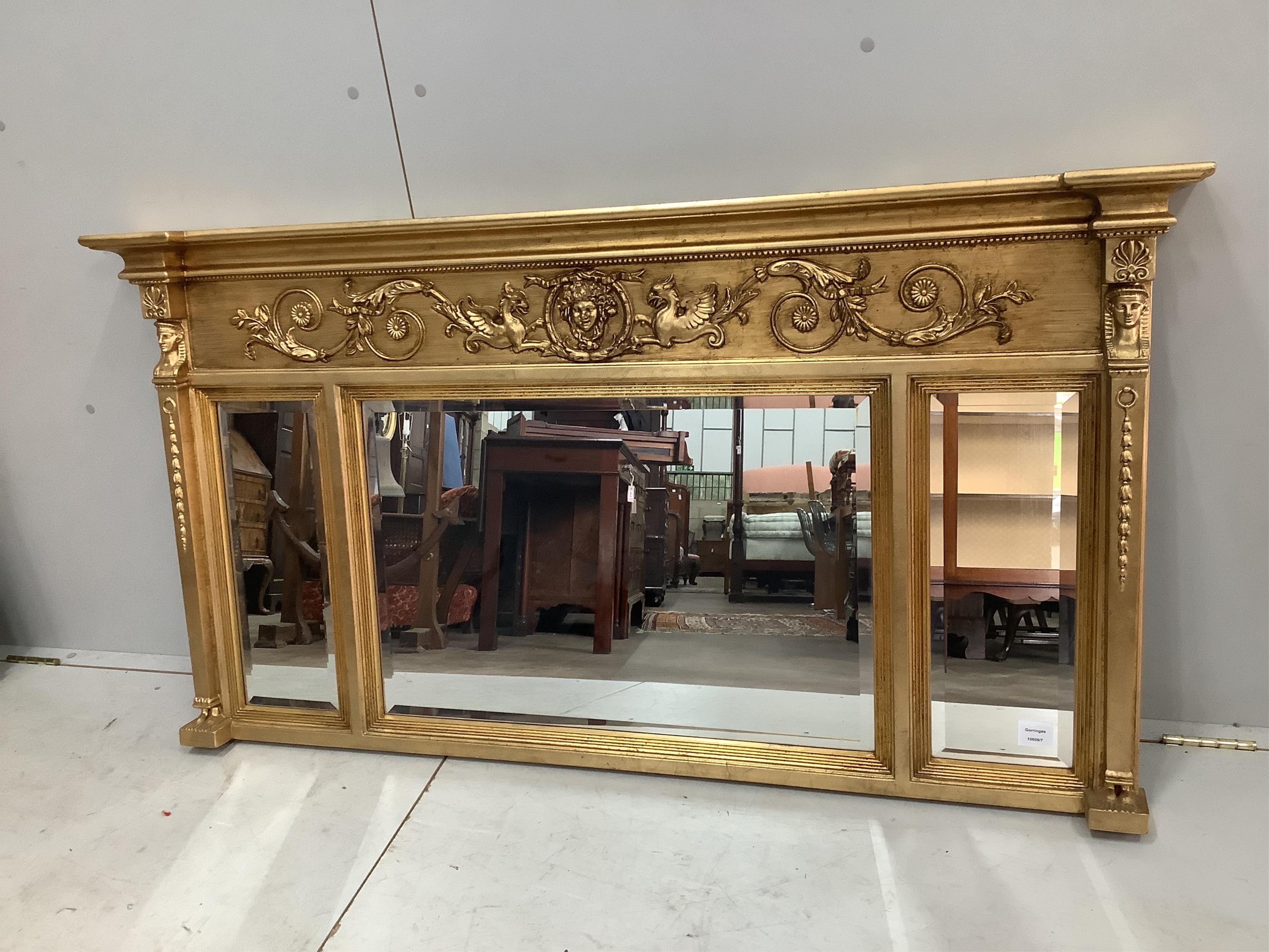 A Regency style gilt composition triple plate overmantel mirror, width 140cm, height 76cm. Condition - good